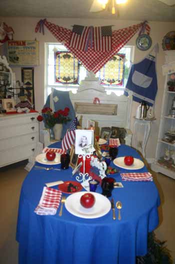 Lots of red, white and blue and Old Glory on the table, too.