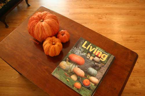 A few pumpkins on the coffee table