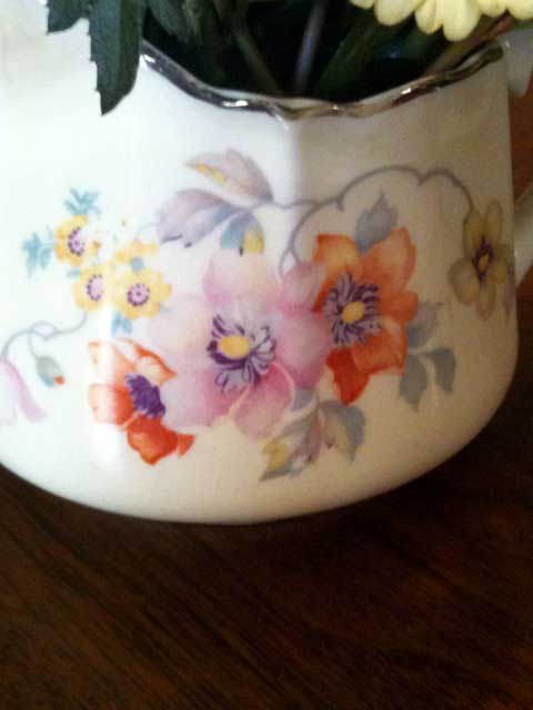 creamer with flowers